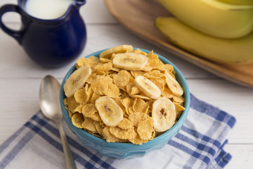 Breakfast Cereal and Bananas in a Blue Bowl