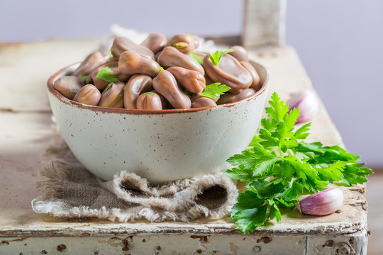 Enjoy your broad beans boiled with parsley and garlic