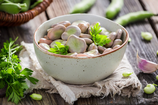 Tasty broad beans boiled with parsley and garlic