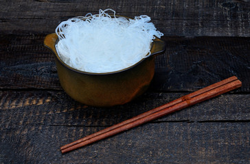 chinese noodle in pot on table