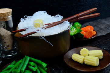 chinese noodle in pot on table