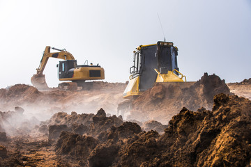 Machines excavating the soil from the beginning of the work