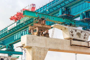 Construction of mass rail transit line in progress, construction bridge crossing © navintar