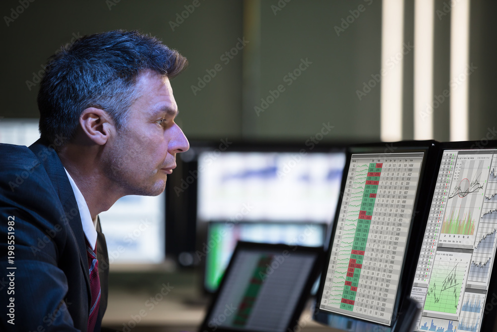 Poster Stock Market Broker Analyzing Graph On Multiple Computer Screen