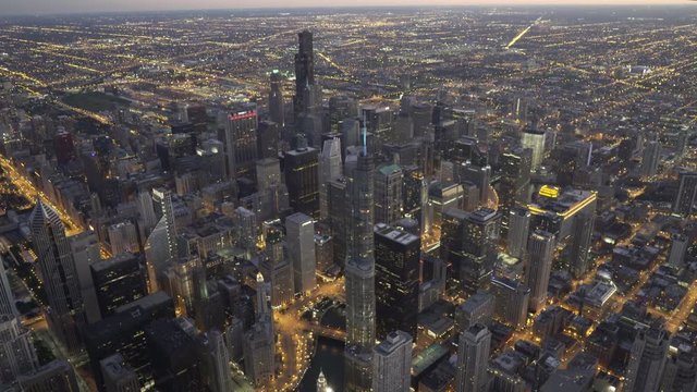 Chicago wide angle aerial view slow orbiting around the Chicago loop at dusk featuring the Trump Tower