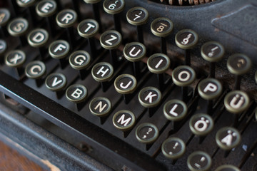 The fragment of  vintage typewriter. Old Typewriter Keys Rounded Vintage. Typing machine with Russian keys. Select focus
