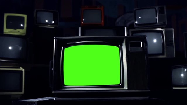 80s Tv Green Screen with Many Tvs. Steel Tone. Dolly Shot.  You can replace green screen with the footage or picture you want with &ldquo;Keying&rdquo; effect in After Effects  (check out tutorials on YouTube). 