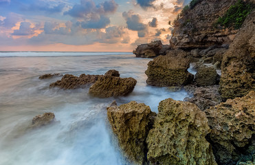 Amazing view of Yogyakarta seascape with natural coastal rock as foreground