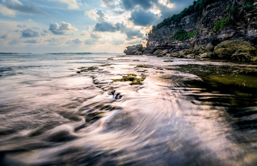 Amazing view of Yogyakarta seascape with natural coastal rock as foreground