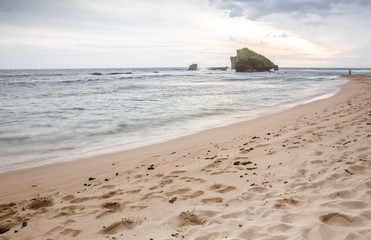Amazing view of Yogyakarta seascape with natural coastal rock as foreground