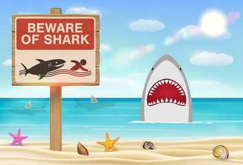 beware of shark sign on sea sand beach