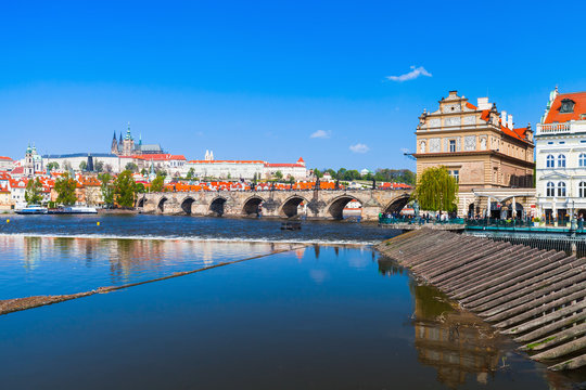 Prague in summer day, dam on Vltava river