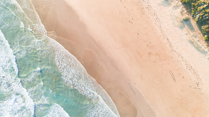 Aerial View of Waves and Beach Along Great Ocean Road Australia at Sunset