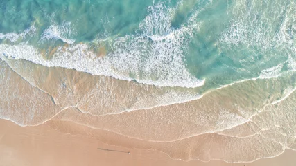 Raamstickers Aerial View of Waves and Beach Along Great Ocean Road Australia at Sunset © Judah
