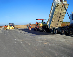 Road construction machinery in activity