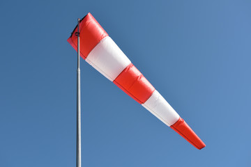 Wind cone against blue sky