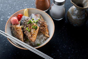 Saba  fish grill with teriyaki sauce on rice.