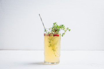 Tasty bitter cocktail with thyme. Selective focus.