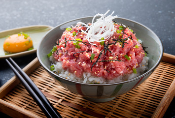 Raw tuna and onion with rice in Japanese style.