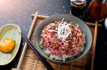 Raw tuna and onion with rice in Japanese style.