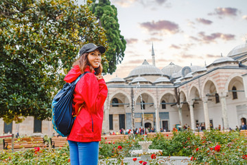 happy young tourist woman visit ancient Istanbul Topkapi palace