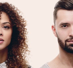 Close-up face of a serious young couple