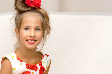 Little girl with a bouquet of flowers