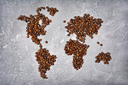 Symbolic image of world map made from roasted coffee beans