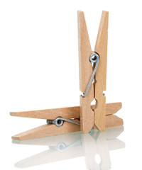 Household things, wooden clothespins isolated on white