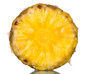 Cross section of ripe juicy pineapple isolated on white