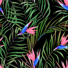 Botanical exotic seamless pattern, green tropical leaves and flowers, summer vector illustration on black background. Watercolor style