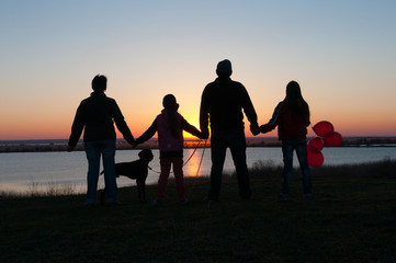Fototapeta na wymiar sunset with family