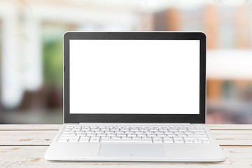 Fototapeta premium Laptop with blank screen on table