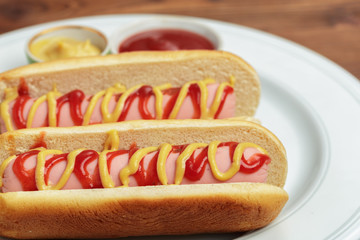 Hot dogs on wooden background