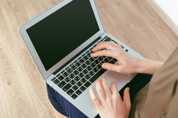 Fototapeta premium Woman Using Laptop, Indoors