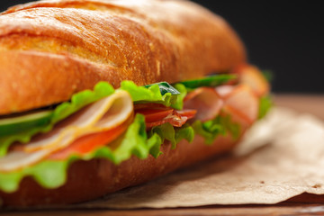 sandwich on a wooden table