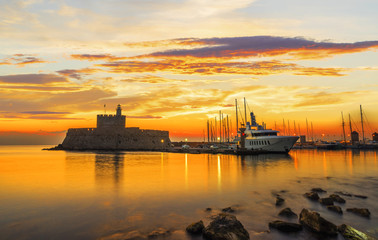 Obraz premium Agios Nikolaos fortress on the Mandraki harbour of Rhodes Greece
