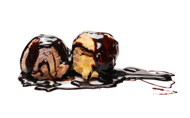 Ice cream balls, scoops with chocolate topping isolated on white background