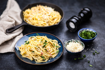 Spaghetti carbonara with egg and pancetta