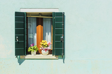 window on the island of Burano, Venice