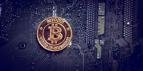 Golden bitcoins with selective focus .New virtual money.