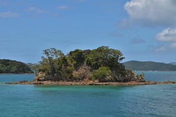 Fototapeta premium small lonely island in blue sea