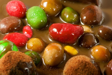 colorful candies in chocolate close-up