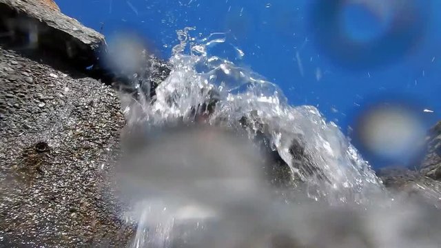 Water against the camera. cascade. Wet. Splash. Spray.