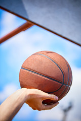 man holding a basketball