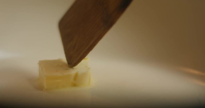 Butter Melting In Frying Pan Overhead Shot