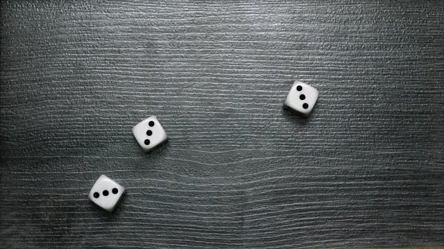 Poker Dice rolling tripple