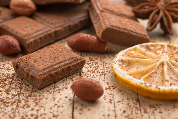 Milk chocolate with nuts, and spices. Macro