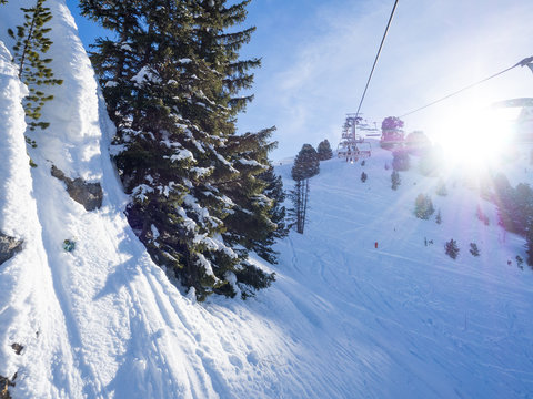 Mountain ski resort with snow in winter. Alps, France. panoramic view of mountains on a clear sunny winter day, Meribel