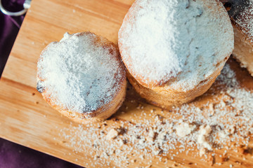 Easter cakes with icing sugar and raisins